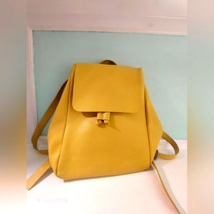 Faux leather yellow zara bagpack